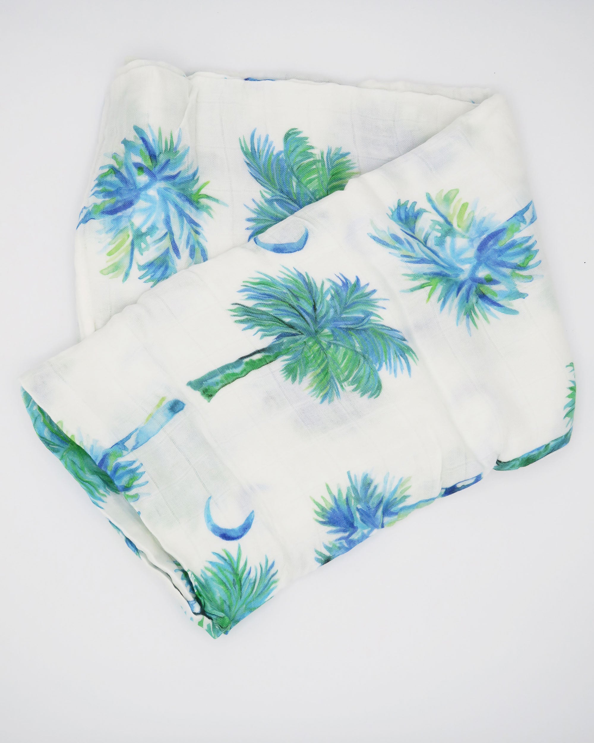 Blue Palmettos Print Baby Swaddle with Watercolor Palmetto Trees Design. blue palmettos hand-painted and printed on soft white fabric.