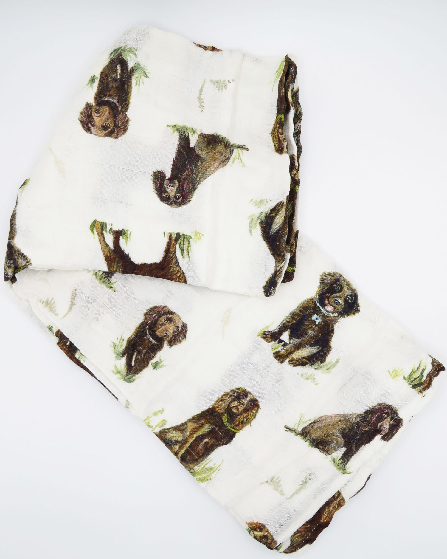 Soft baby swaddle made from organic cotton and bamboo featuring adorable Boykin Spaniel print