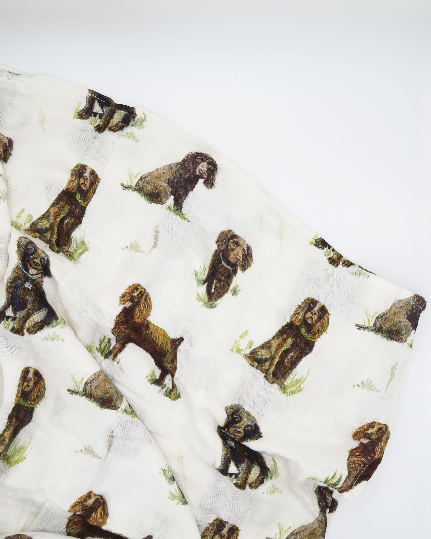 Soft baby swaddle made from organic cotton and bamboo featuring adorable Boykin Spaniel print
