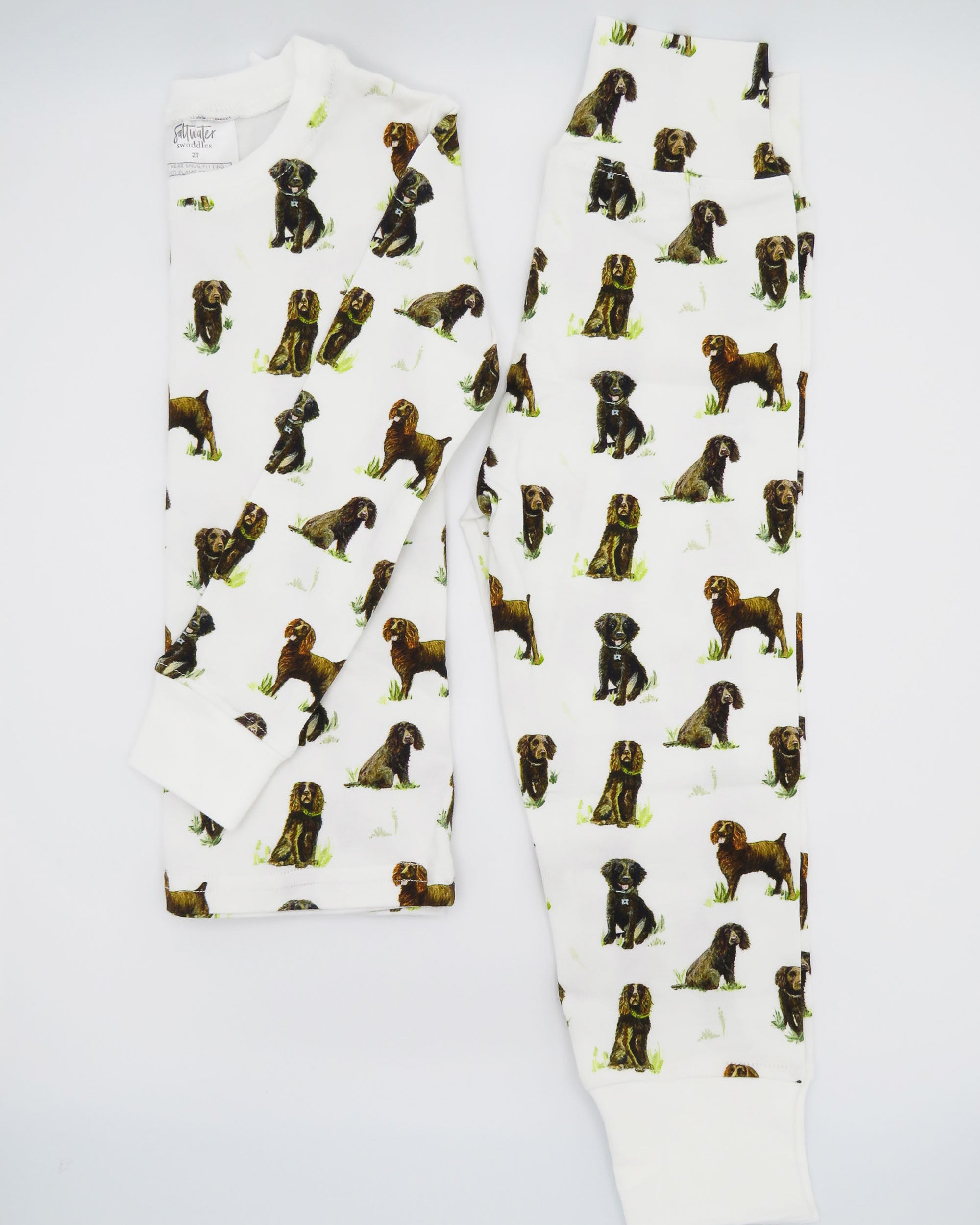 Cozy toddler pajamas featuring Beaufort Boykins print on a soft white fabric.