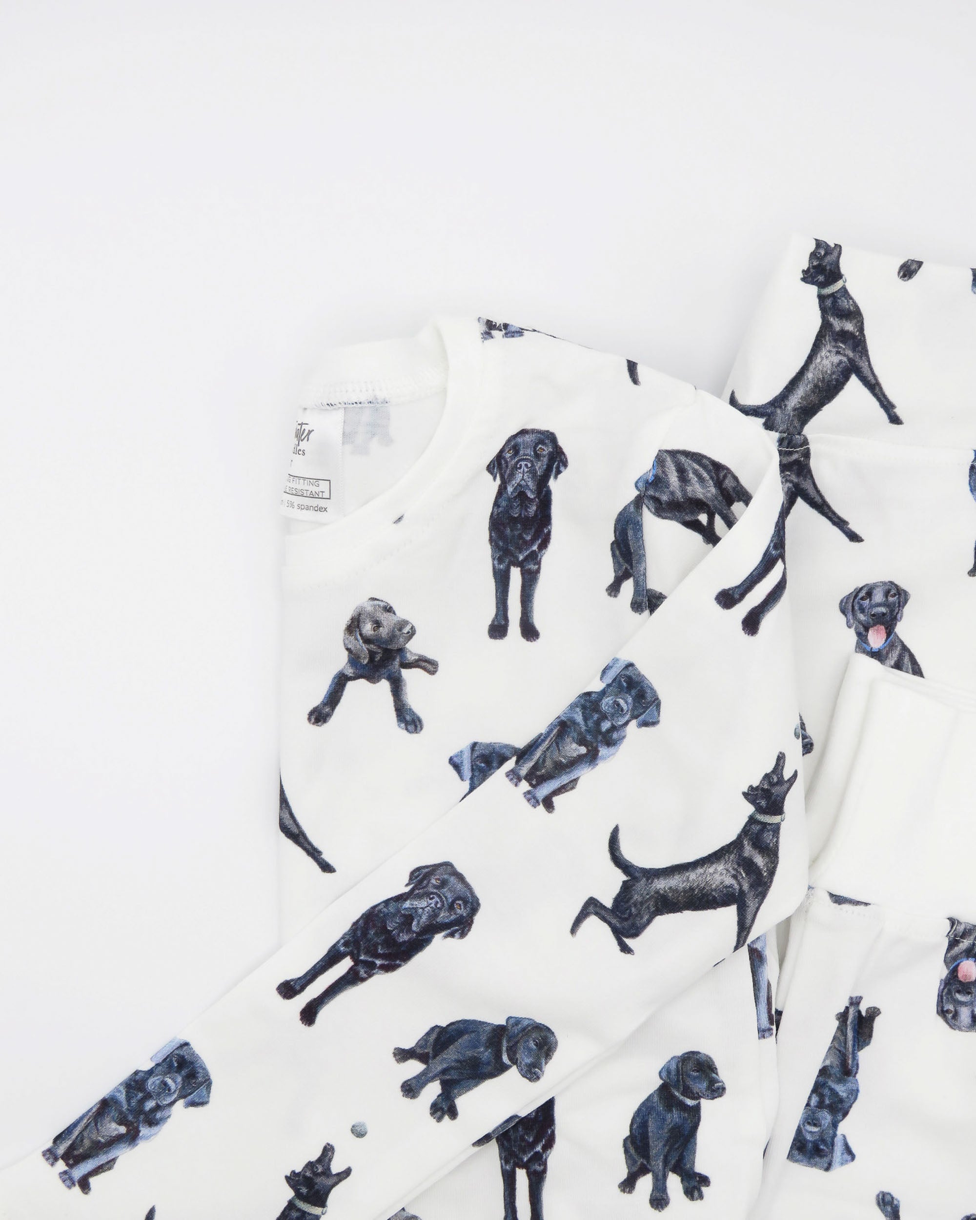 Soft and stretchy kids pajamas adorned with a cute Black Labs print, designed for comfort and durability, making them a favorite choice for little dog lovers