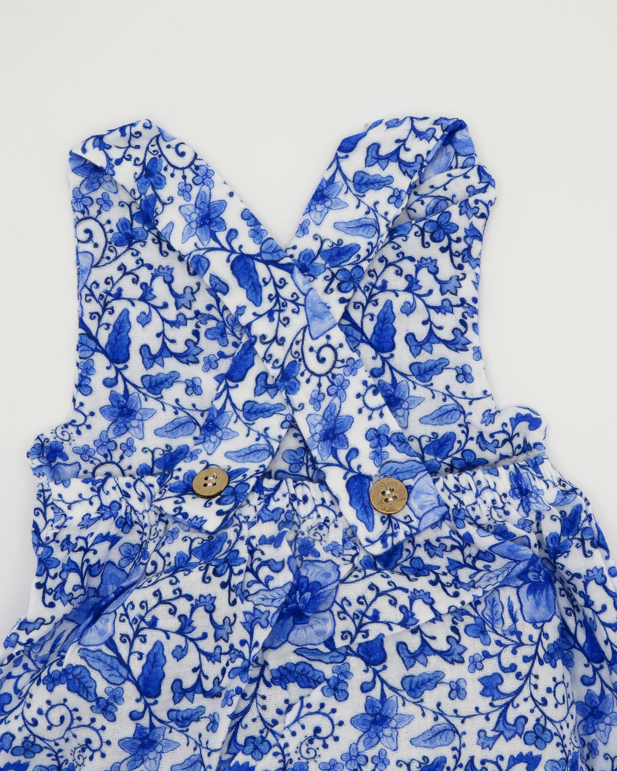 Charming Chinoiserie kids sunsuit in organic cotton with southern floral pattern