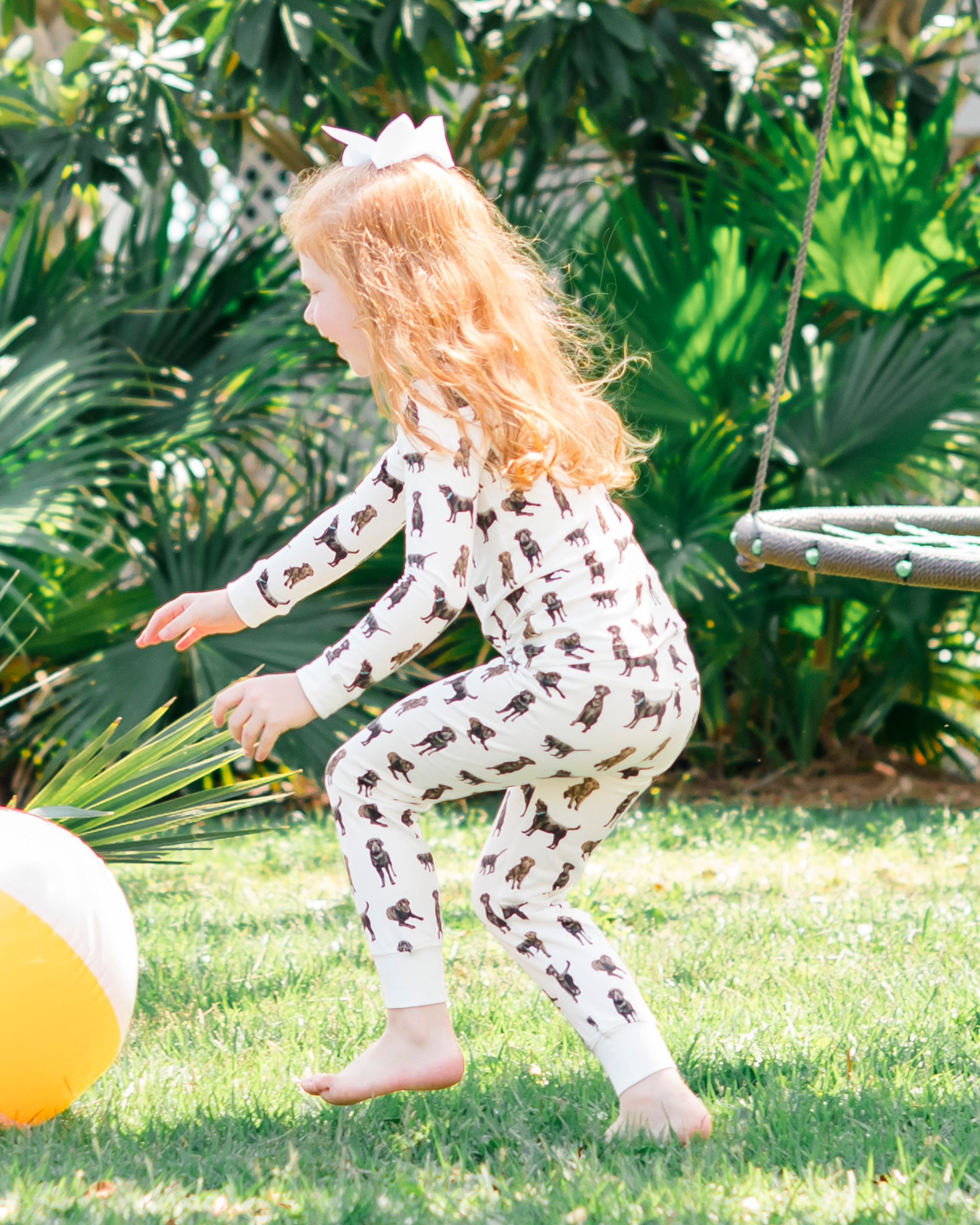 Adorable kids soft and comfy pajamas featuring Chocolate Labs printed on soft white fabric.