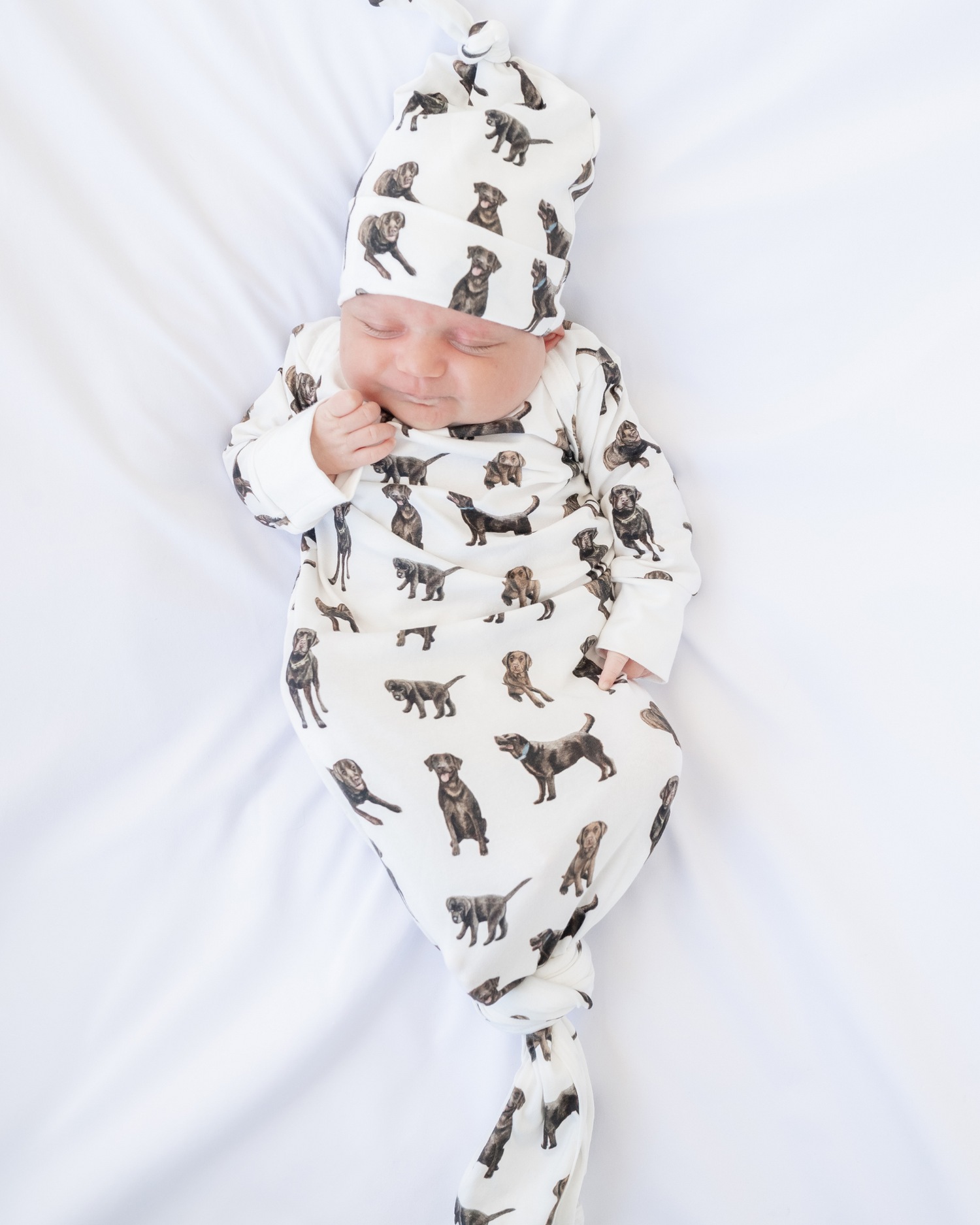 Newborn gown and hat set featuring a cute Chocolate Lab design