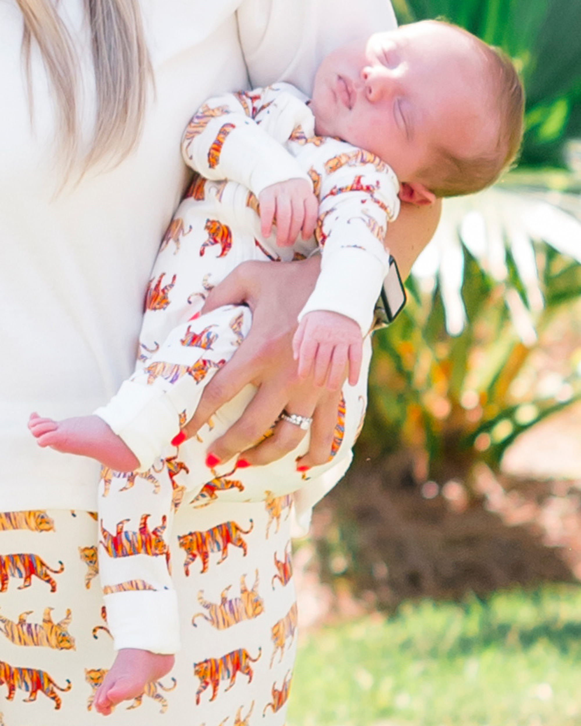 Convertible zip footie for kids with playful tiger pattern, made from gentle fabric
