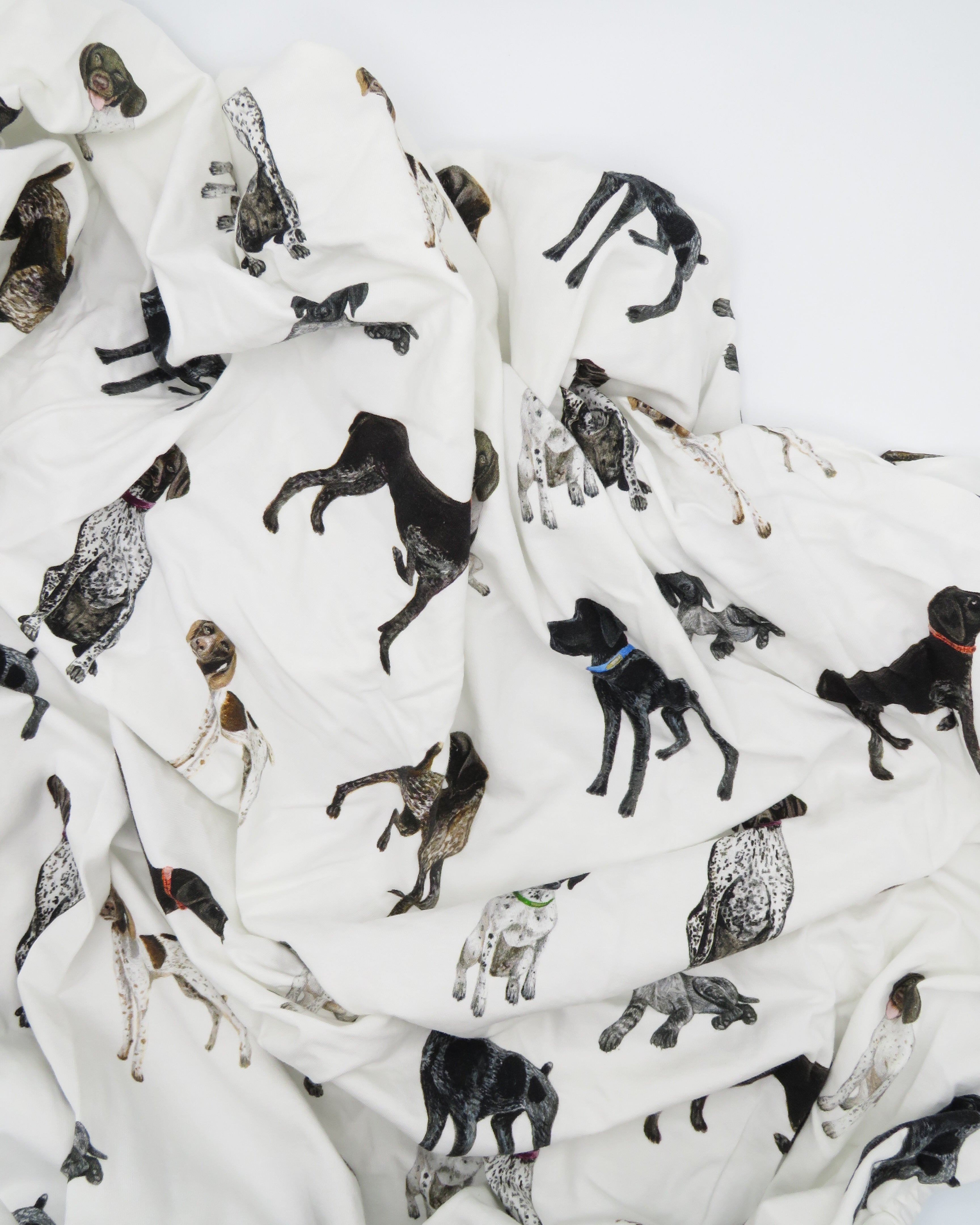 German Shorthaired Pointer print crib sheets featuring a variety of GSP patterns in 100% soft white cotton fabric.