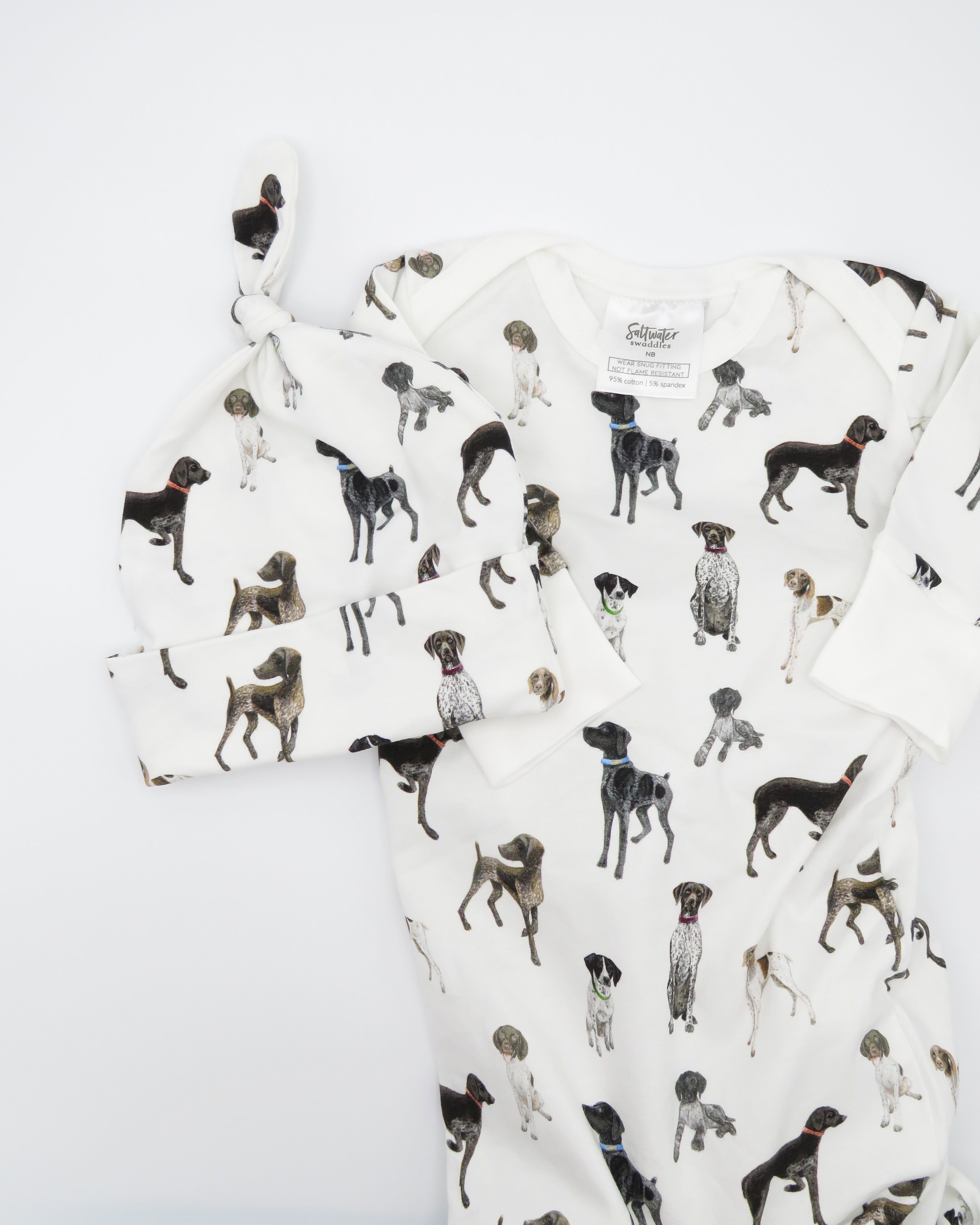 Cozy and soft Newborn gown + hat featuring German Shorthaired Pointer printed on soft white fabric, perfect addition to your hospital bag.