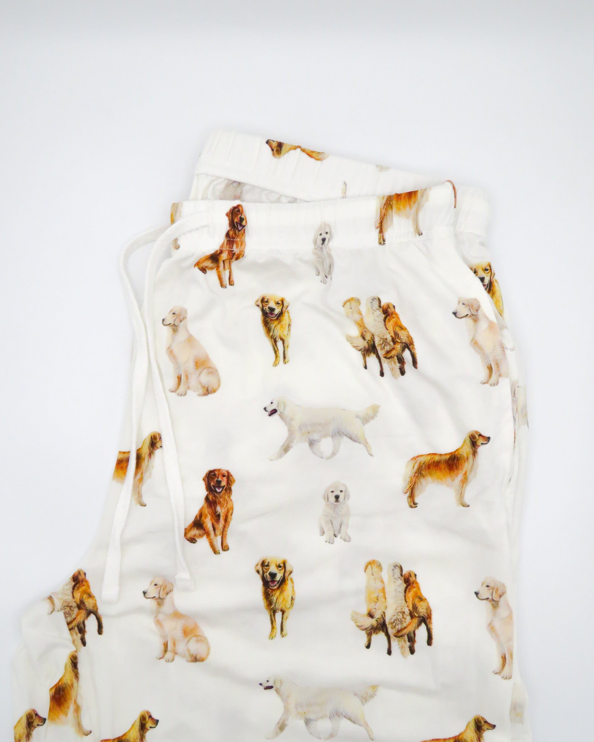 Unisex loungewear pants featuring golden retriever dog pattern perfect for dog lovers