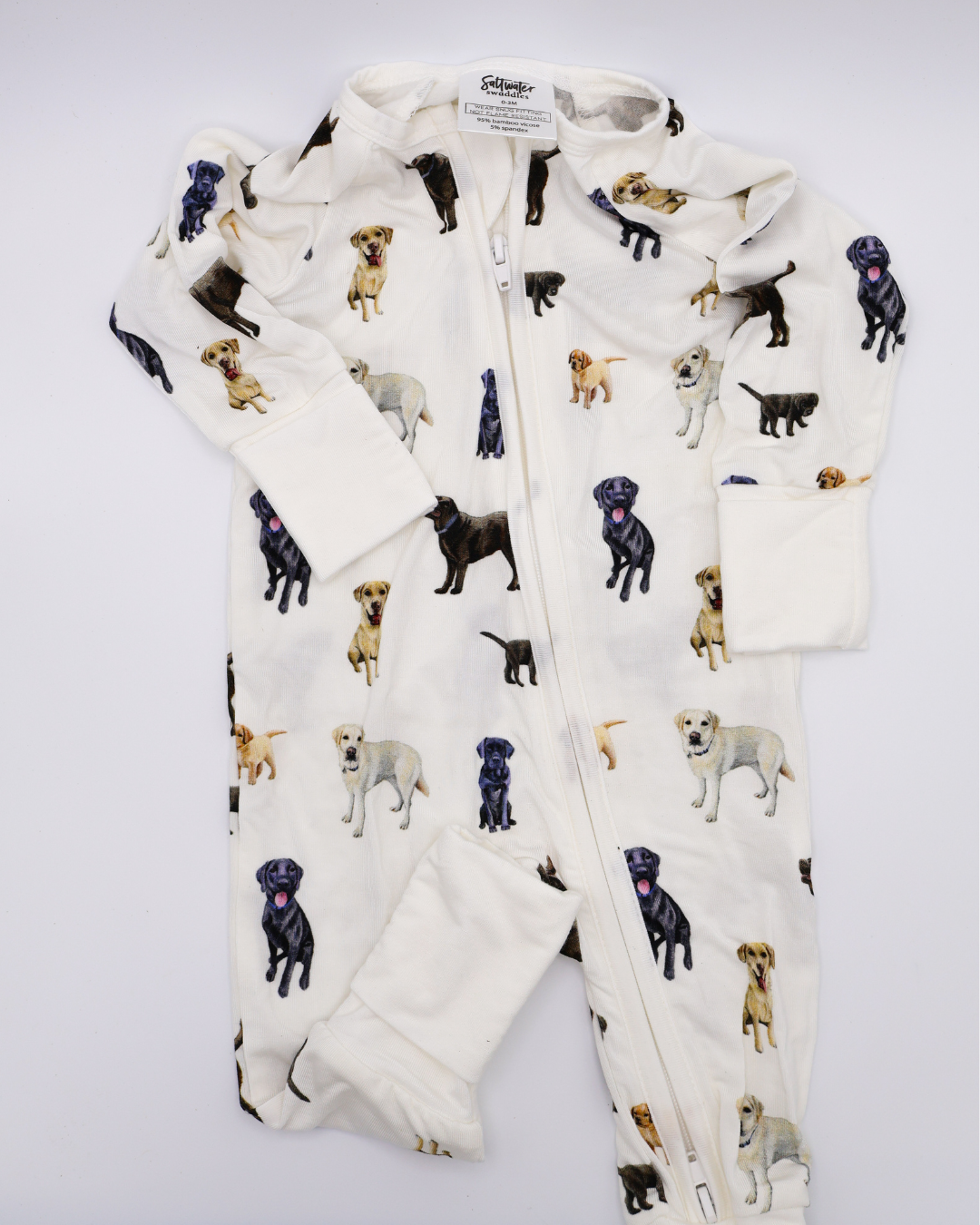 A convertible zip footies for babies, featuring an all-over print of black, chocolate and yellow labs. Displayed flat on a white background.
