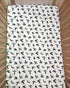 Adorable duck pattern crib sheet in soft colors, great for a gender-neutral duck-themed nursery.