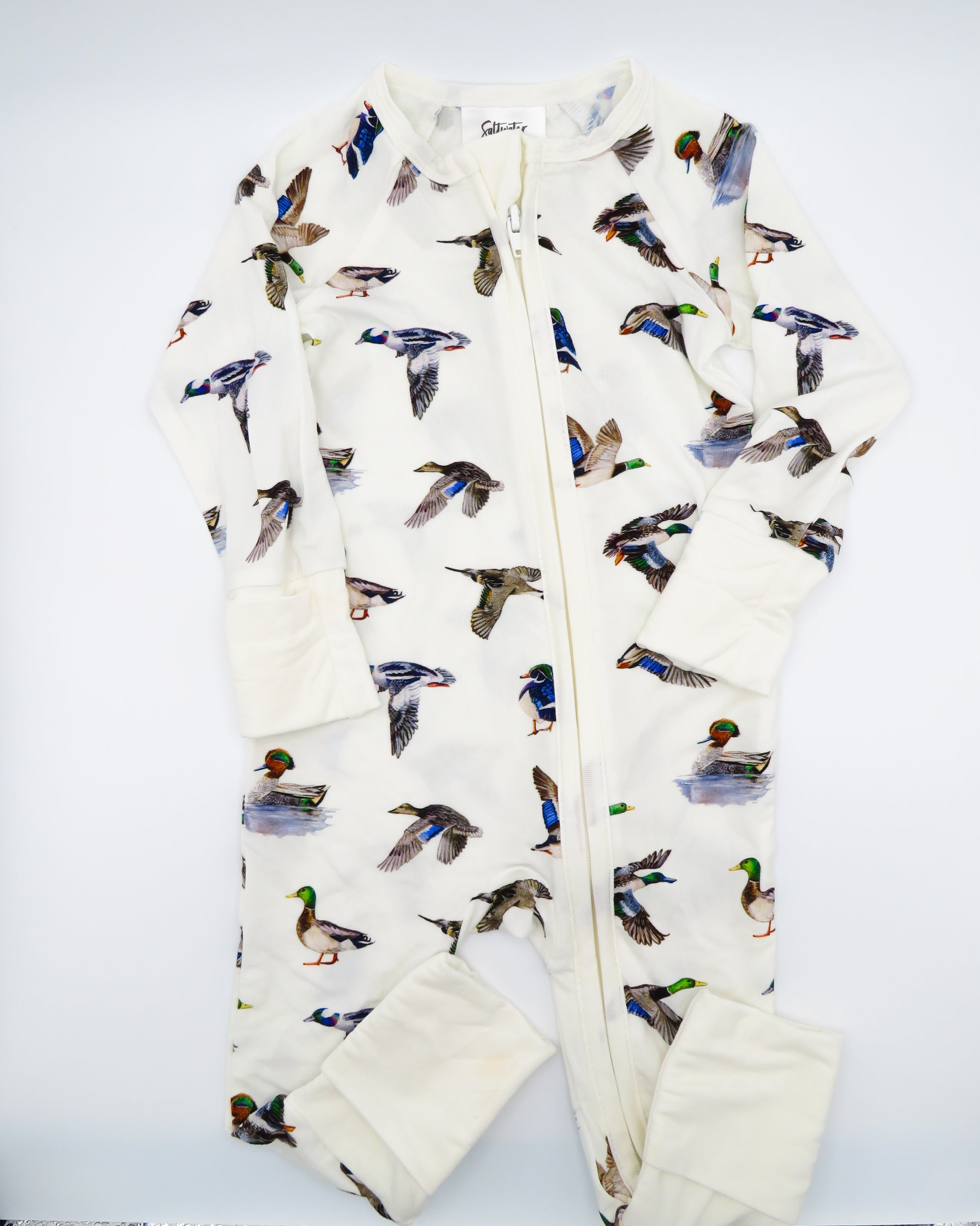 Unisex duck-print convertible zip footies for babies, designed for comfort and breathability.
