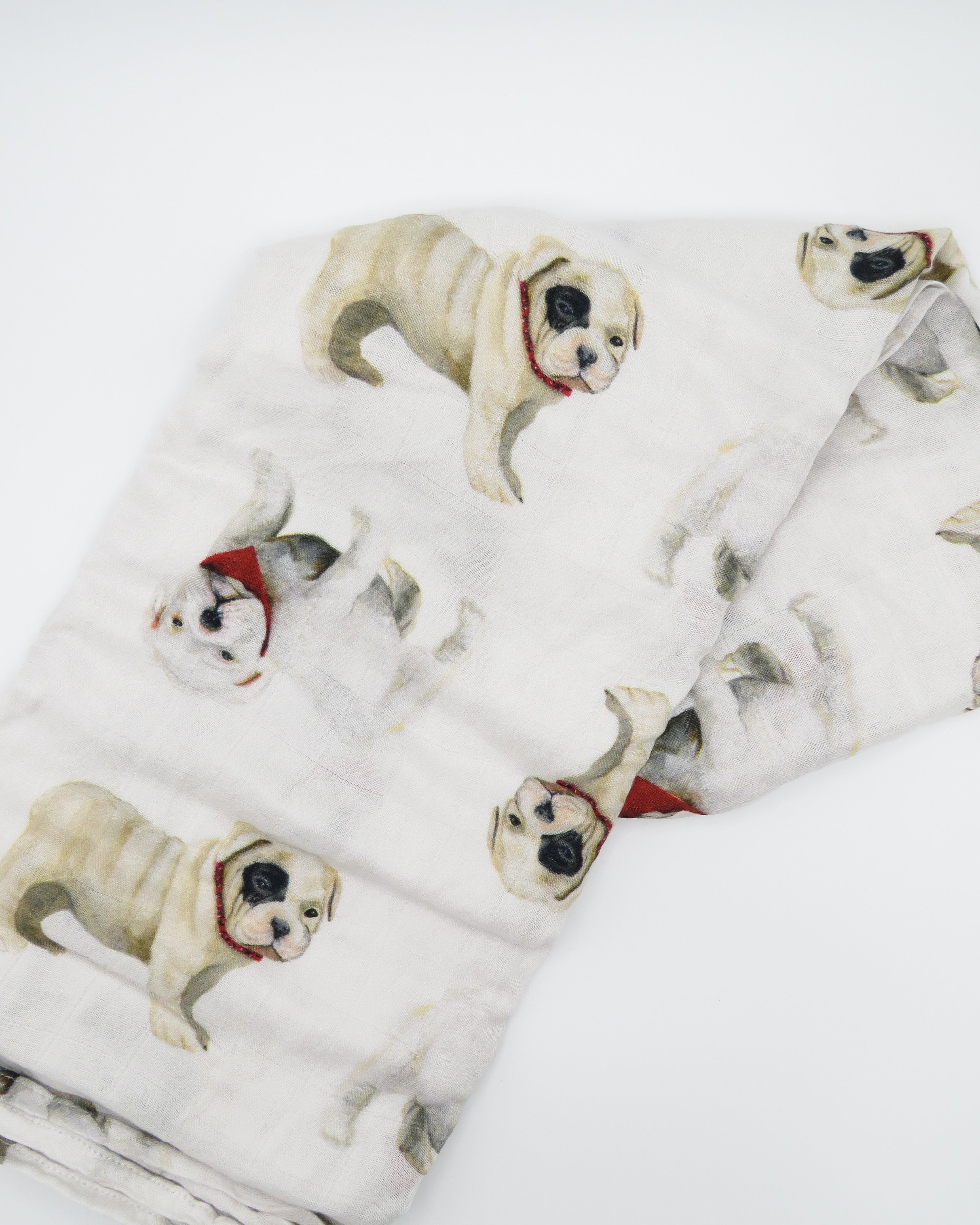 A unisex newborn swaddle with bulldog patterns.