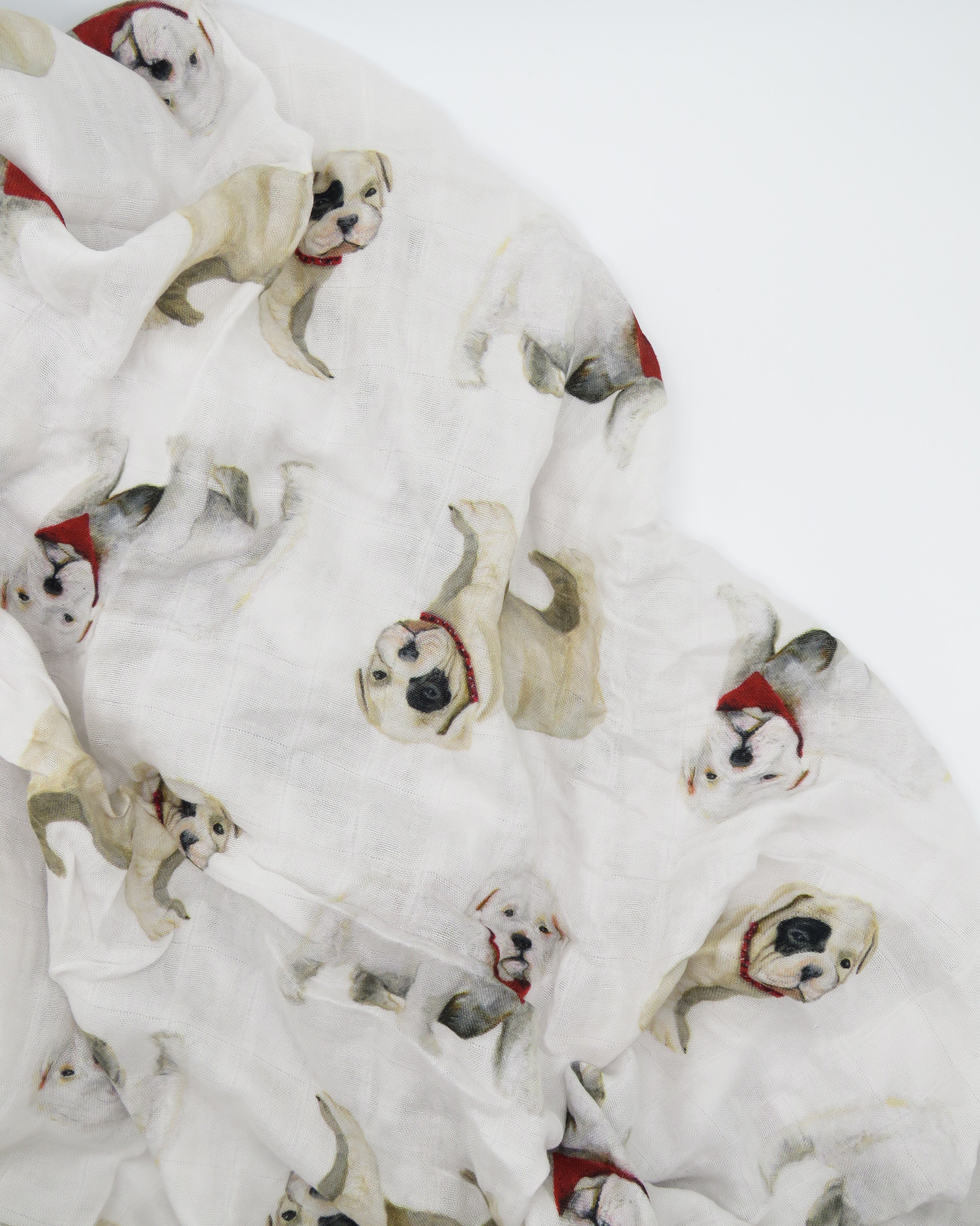 A unisex newborn swaddle with bulldog patterns.