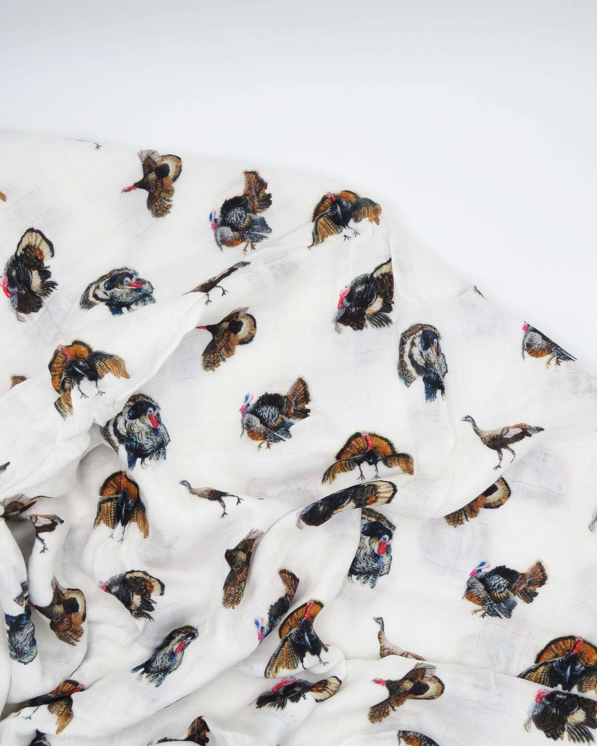 Soft and comfy turkey trot print baby blanket made from organic cotton and bamboo.