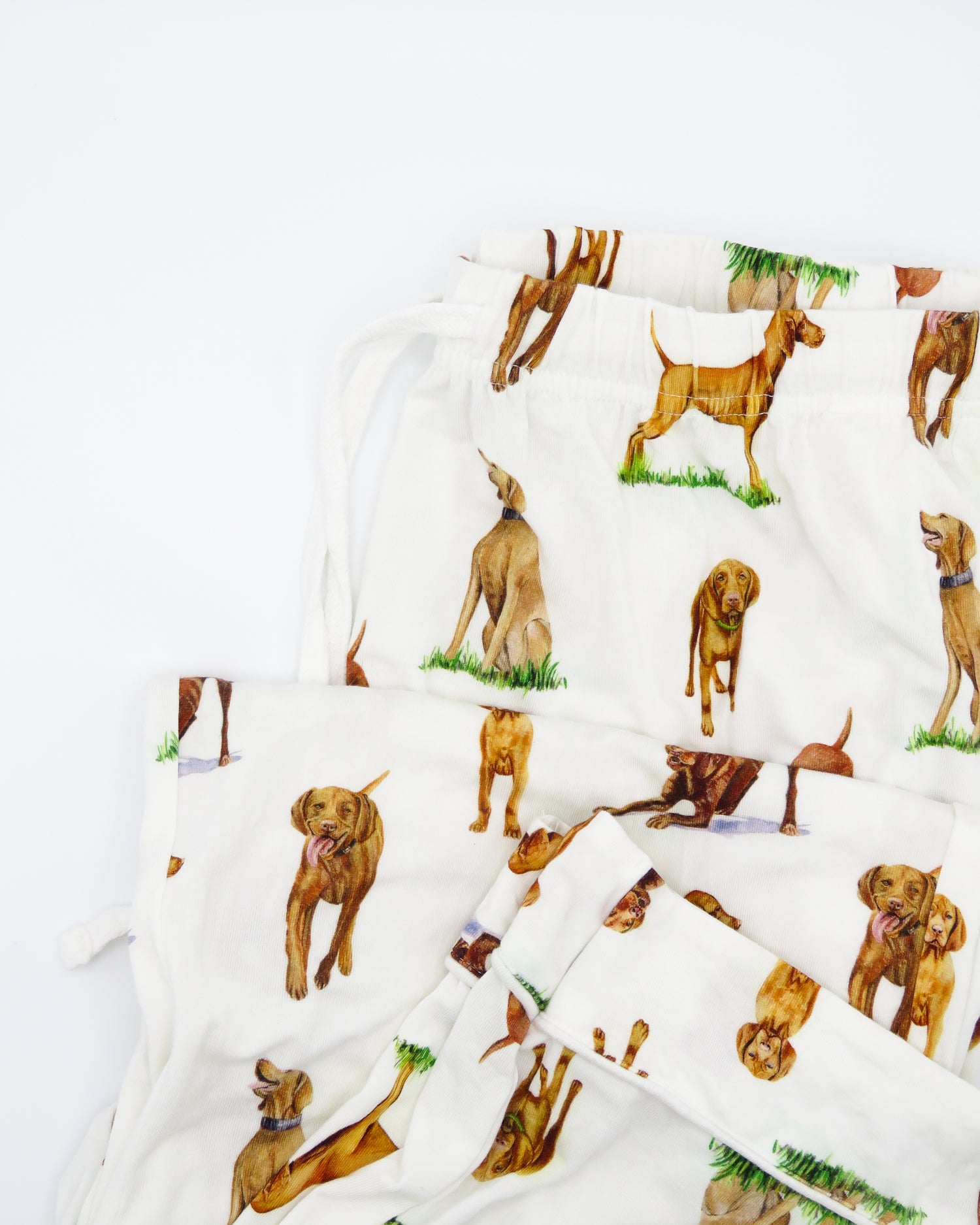 Unisex adult pajama pants with Vizsla dog print, made from breathable fabric for all-night comfort and cozy lounging.