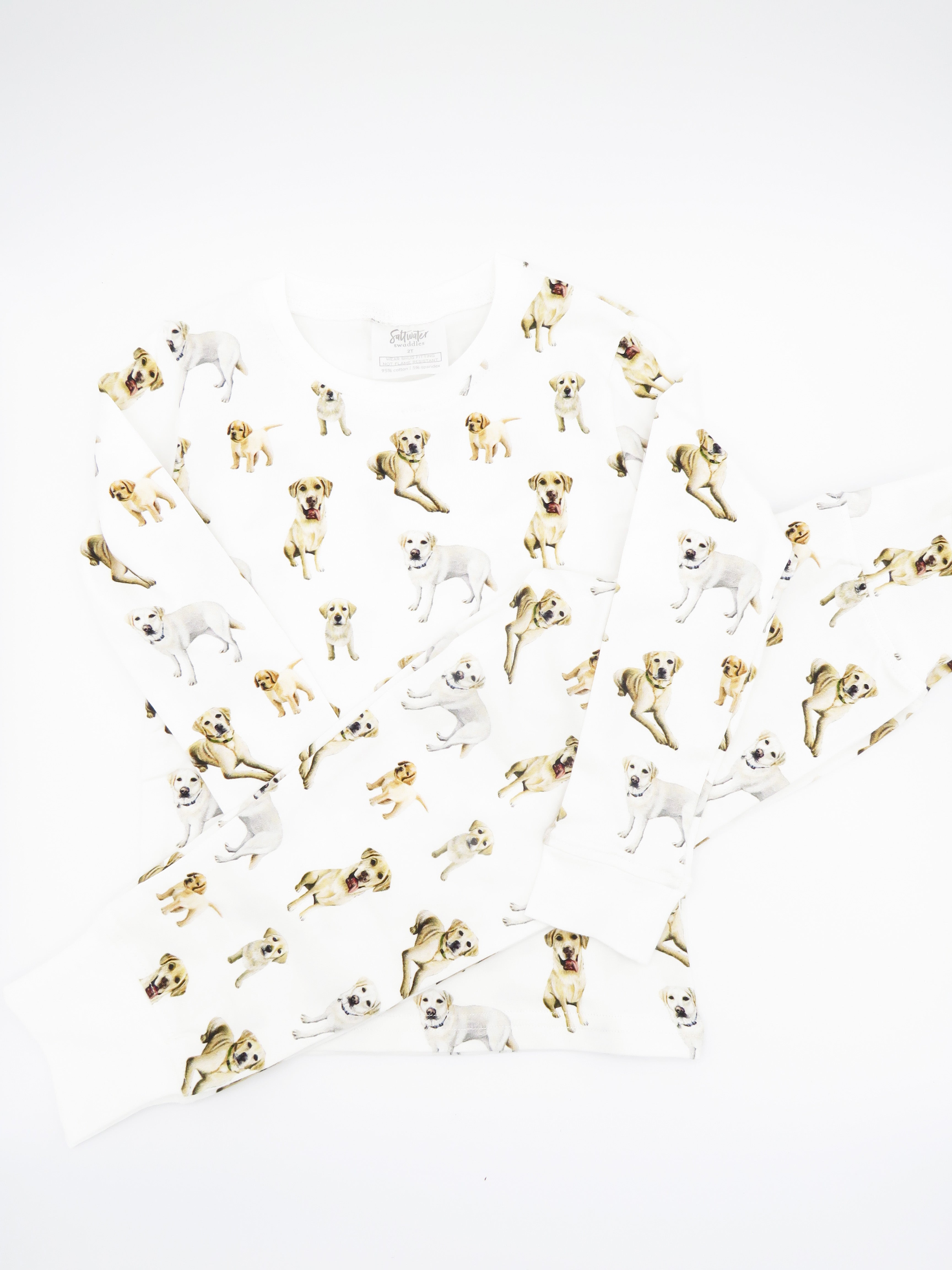 Yellow Labrador print kids pajamas set for bedtime - Sleepwear or loungewear worn by two kids outdoors.