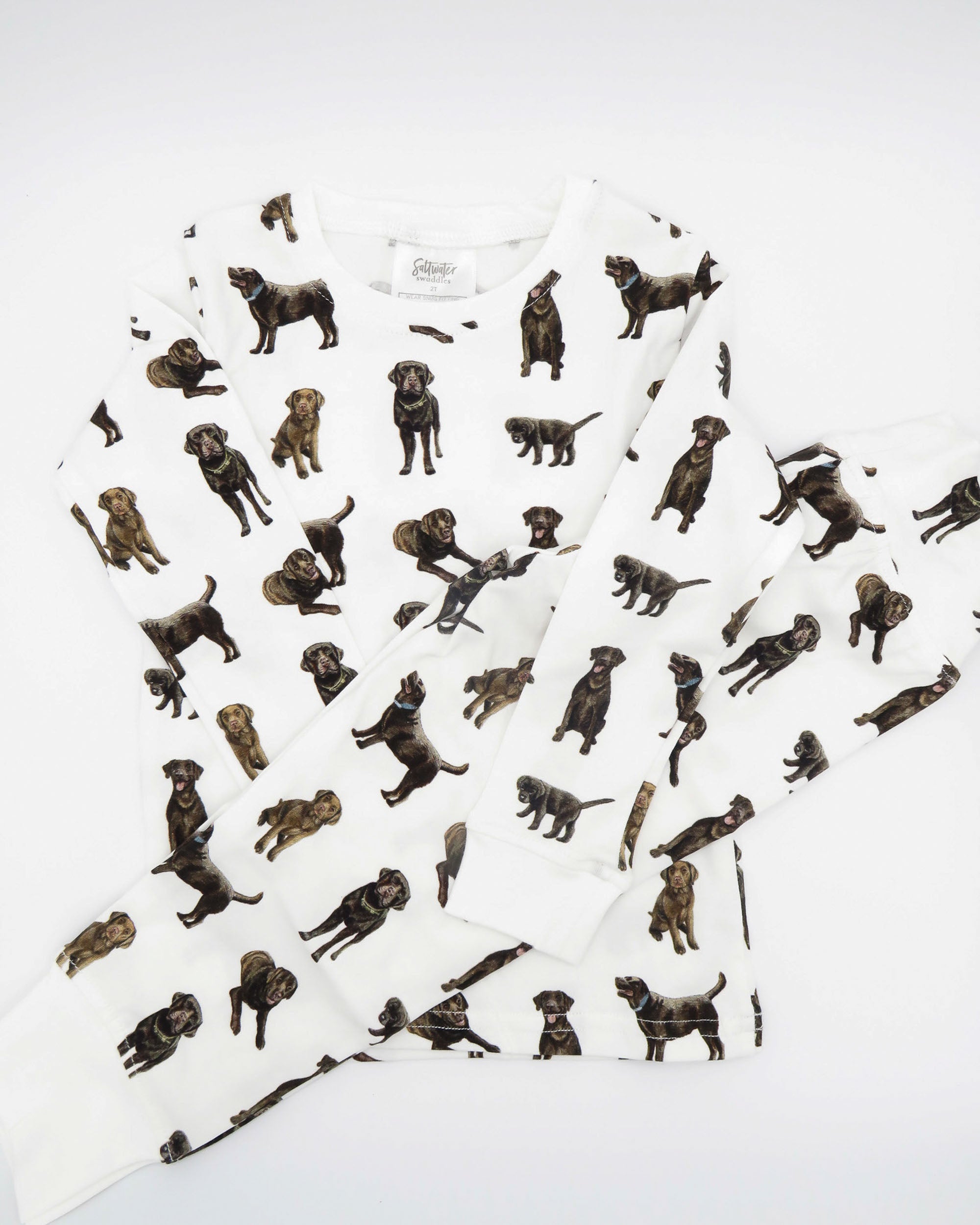 Adorable kids soft and comfy pajamas featuring Chocolate Labs printed on soft white fabric.