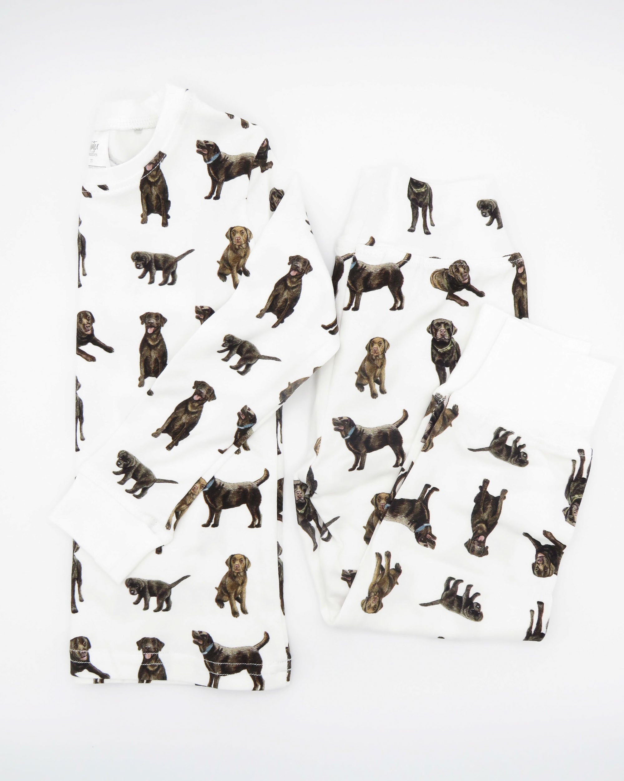Adorable kids soft and comfy pajamas featuring Chocolate Labs printed on soft white fabric.