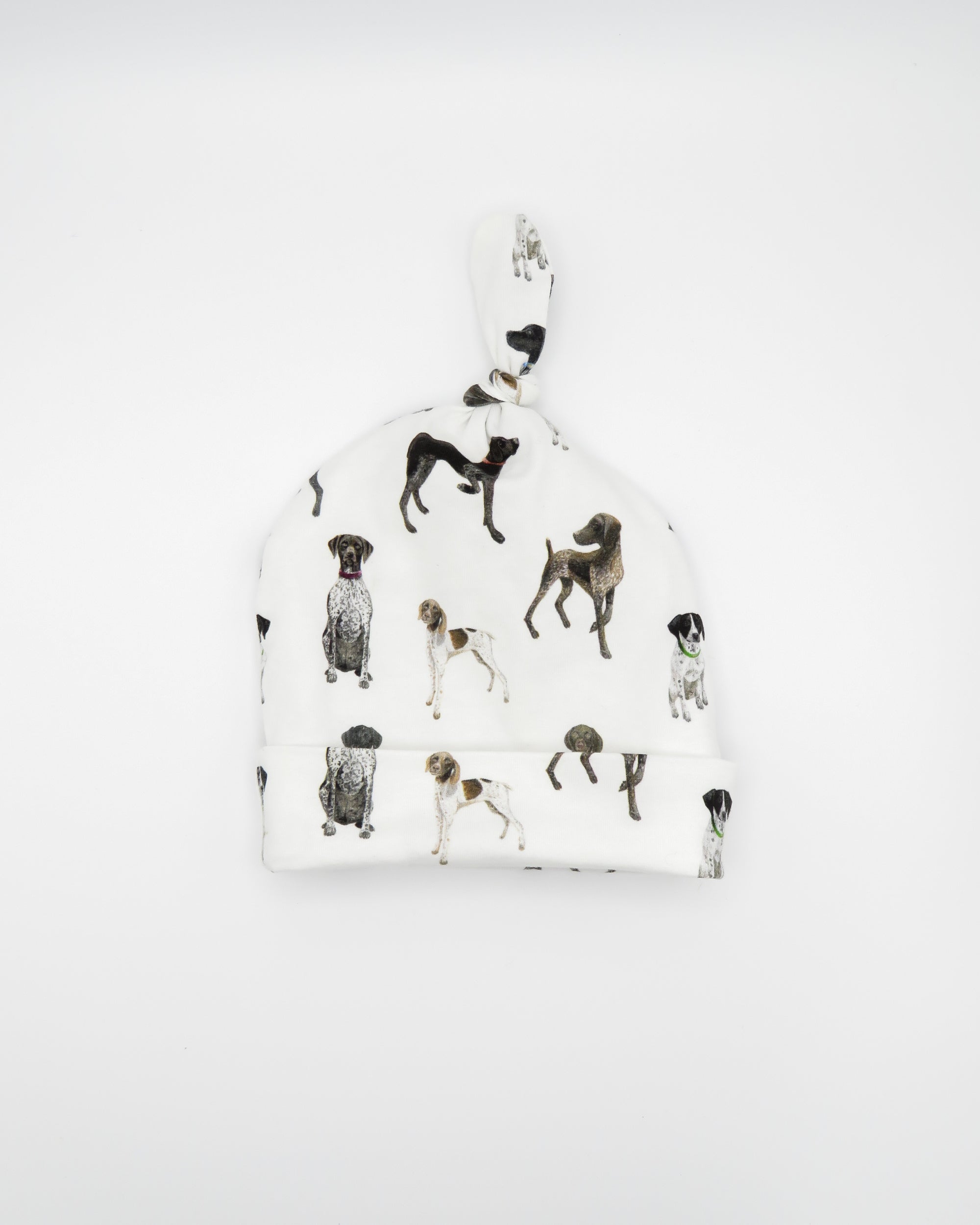 Unisex newborn hat with German Shorthaired Pointer printed on soft white fabric. Designed for newborn comfort.