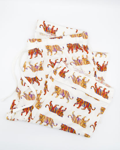 Soft white unisex Easy Tiger print pajama pants.