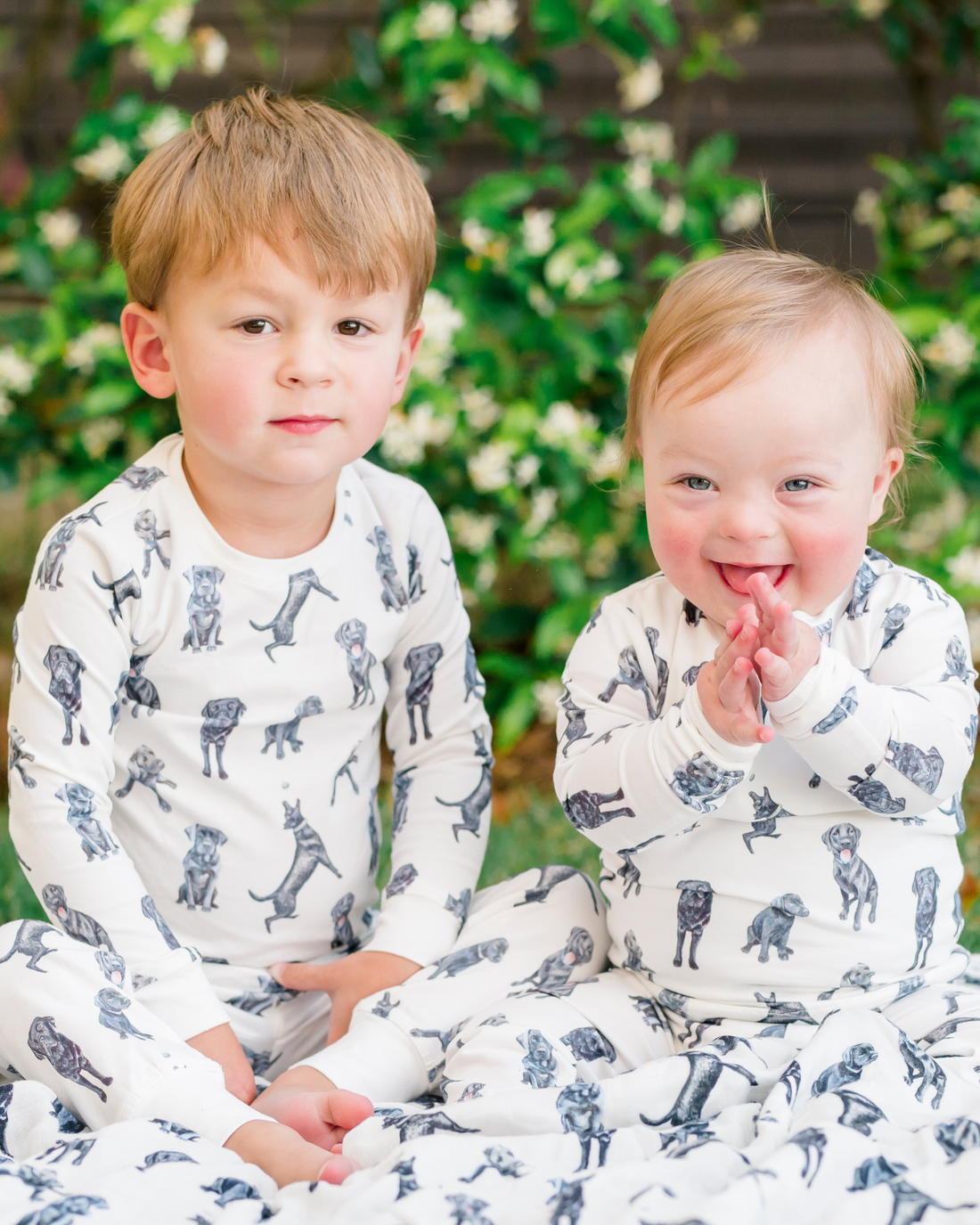 Soft and stretchy kids pajamas adorned with a cute Black Labs print, designed for comfort and durability, making them a favorite choice for little dog lovers