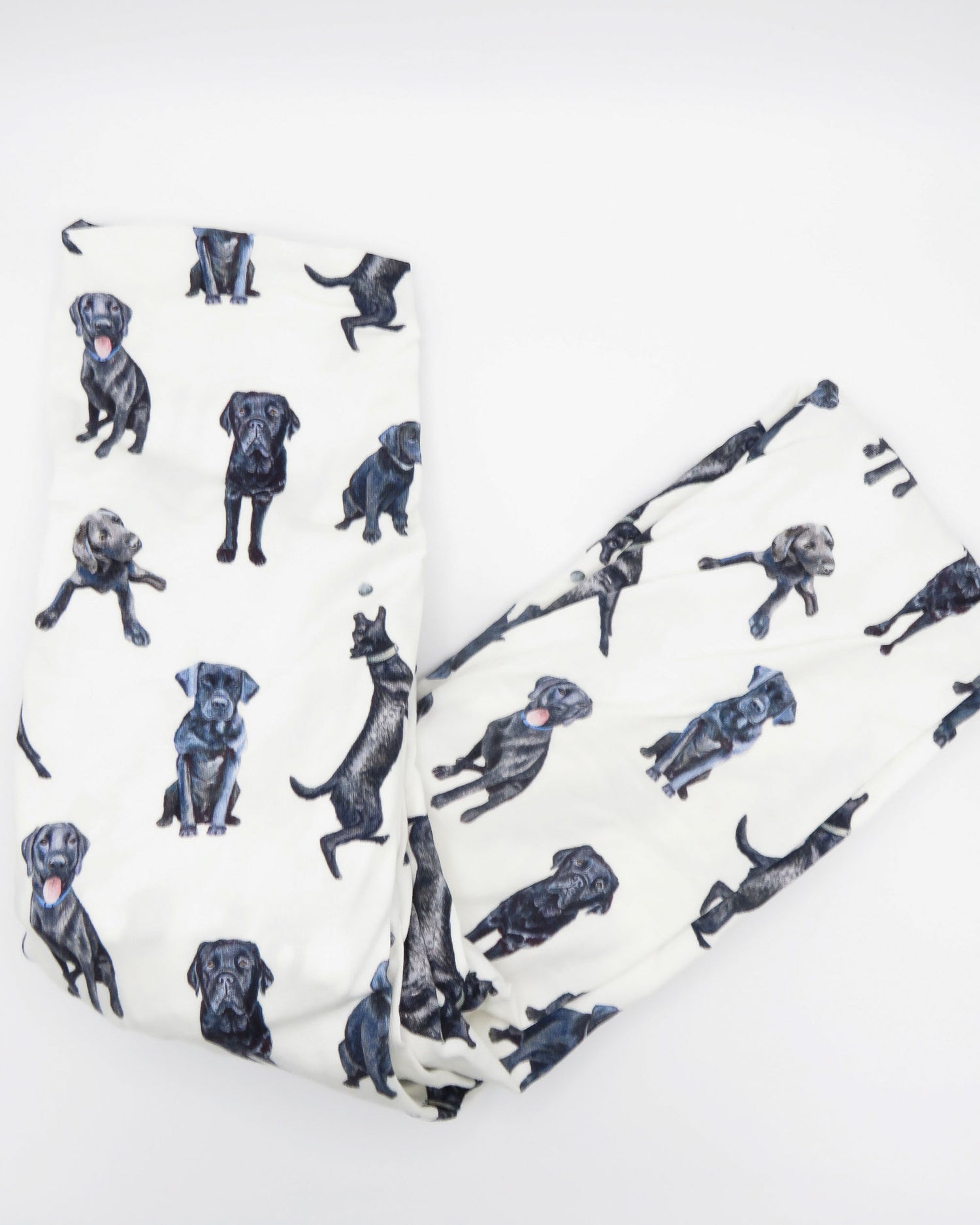 Fitted Black Lab crib sheet with adorable Labrador designs, crafted for durability and softness, perfect for both cribs and toddler beds.