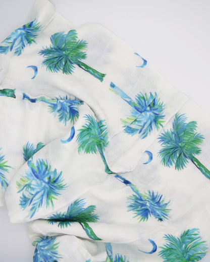 Blue Palmettos Print Baby Swaddle with Watercolor Palmetto Trees Design. blue palmettos hand-painted and printed on soft white fabric. 