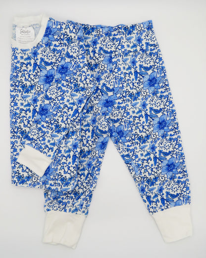Charming Chinoiserie pajamas in soft white cotton, suitable for indoor or outdoor wear, displayed on a white background.