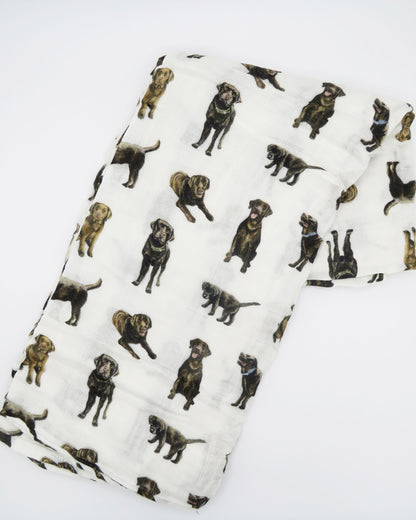 Hand-painted Chocolate Lab print baby swaddle on soft bamboo and organic cotton white fabric.