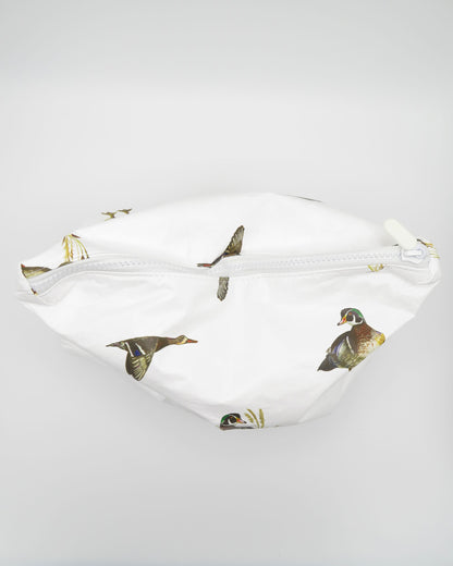 Diving ducks water-resistant white pouch showcasing its unique pattern and craftsmanship.