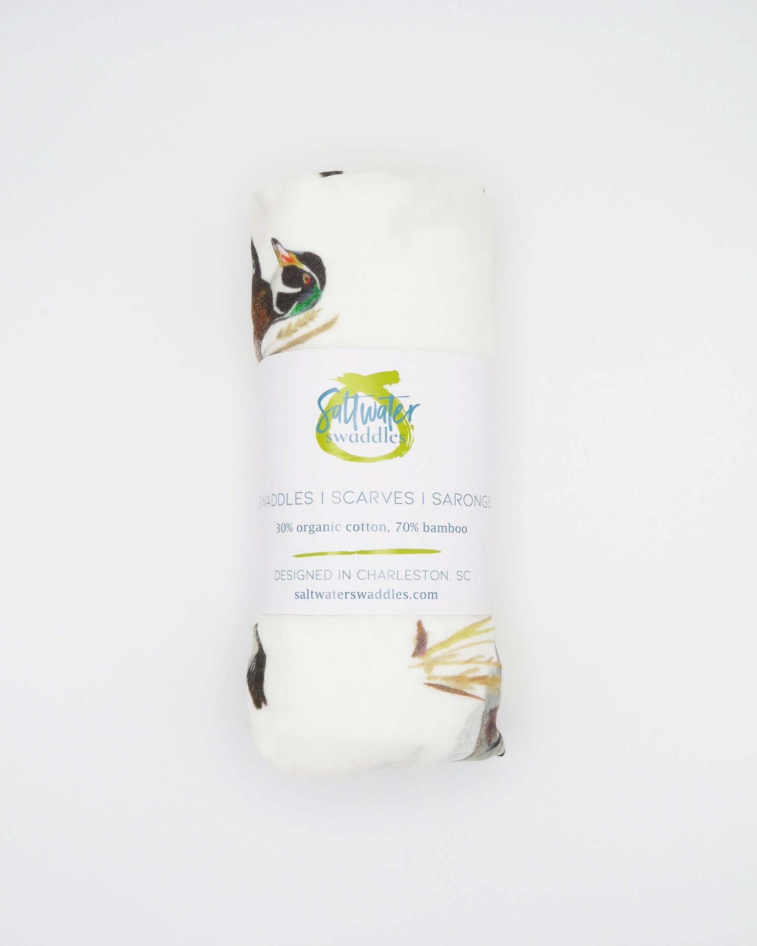 Vibrant watercolor diving ducks pattern swaddle, perfect for wrapping newborns in style and comfort. The soft white fabric features an adorable diving ducks print. Your baby will look precious wrapped in this cute swaddle, ideal for those first special moments and a thoughtful addition to the hospital bag.