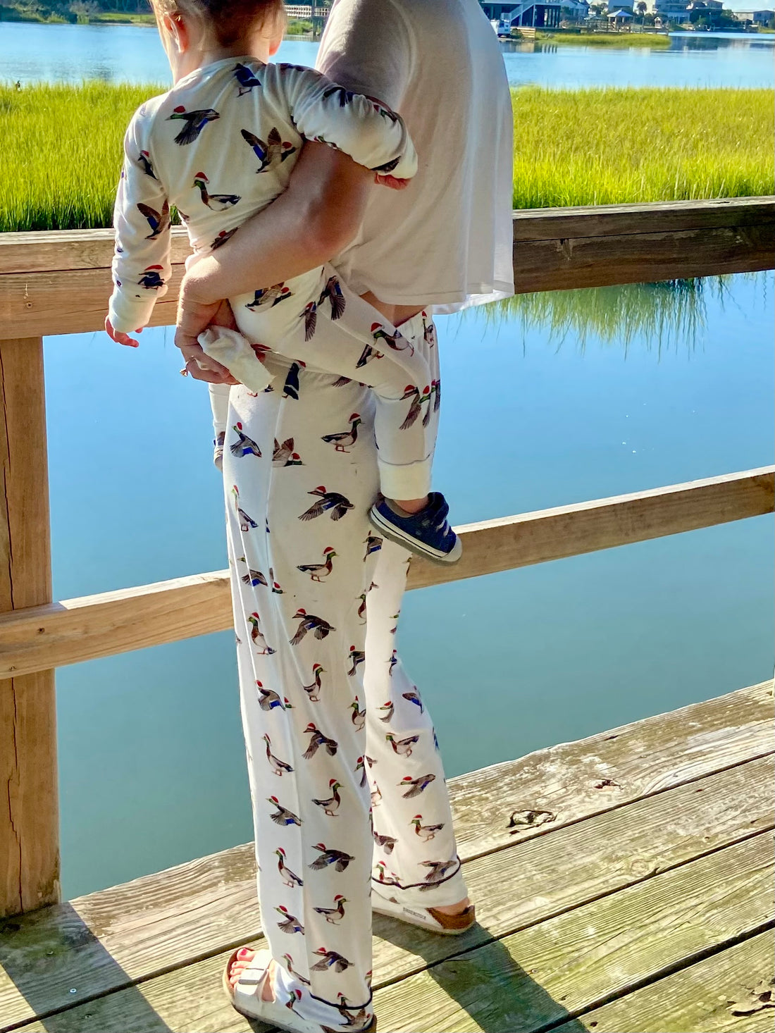 Matching outfits in duck the halls print.