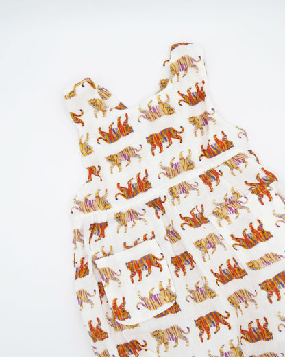 Easy Tiger print Comfy Organic Cotton Sunsuit for Children with Snaps for Easy Diaper Changes. Printed on a soft white fabric.