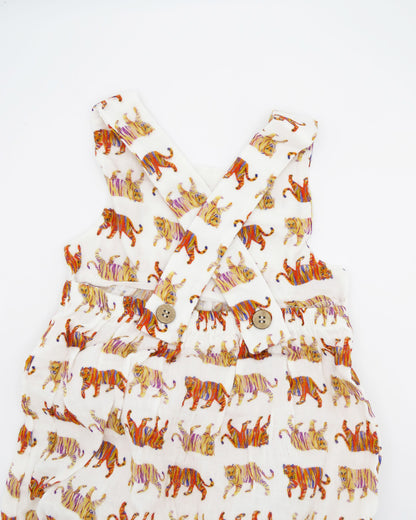 Easy Tiger print Comfy Organic Cotton Sunsuit for Children with Snaps for Easy Diaper Changes. Printed on a soft white fabric.