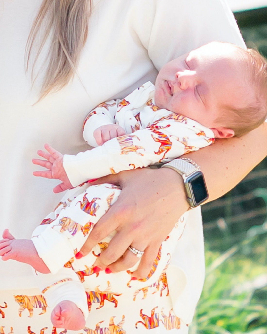 Convertible zip footie for kids with playful tiger pattern, made from gentle fabric