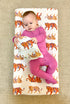 Baby changing pad with Easy Tiger print cover, perfect for jungle-themed nursery
