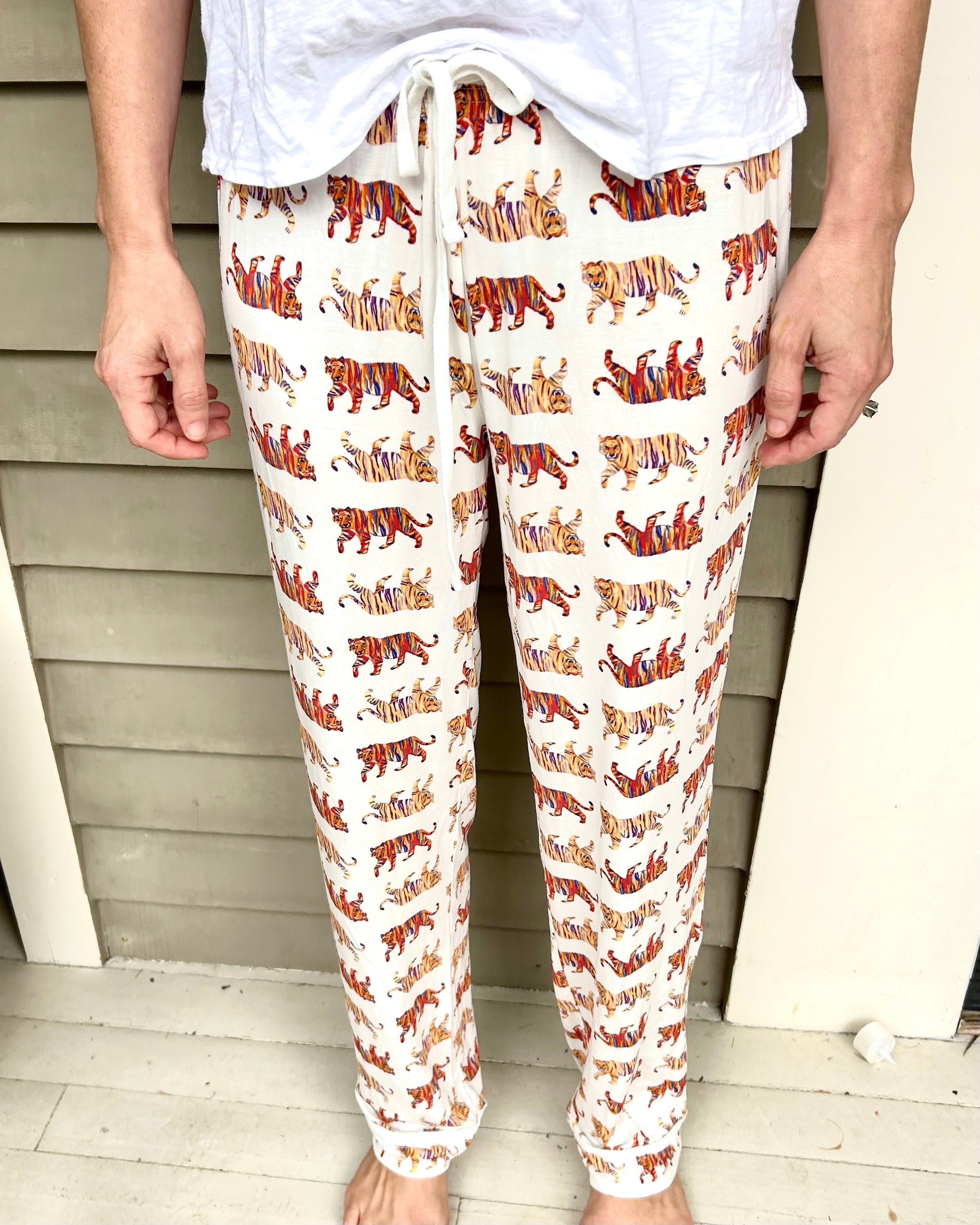 Soft white unisex Easy Tiger print pajama pants. 