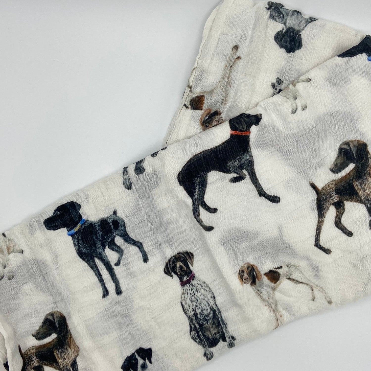 Comfy and breathable swaddle with German Shorthaired Pointer printed on soft white fabric, good for baby’s early days