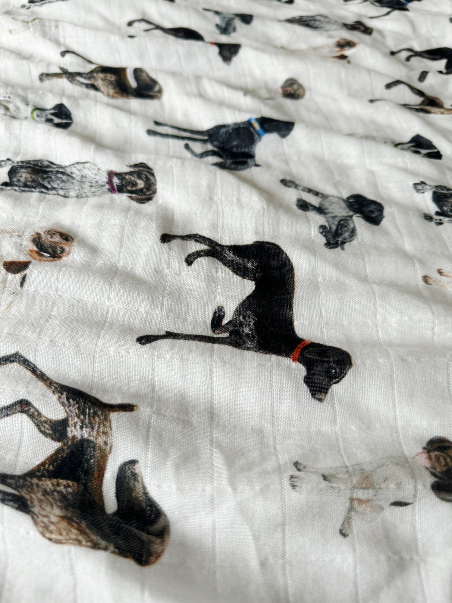 Comfy and breathable swaddle with German Shorthaired Pointer printed on soft white fabric, good for baby’s early days