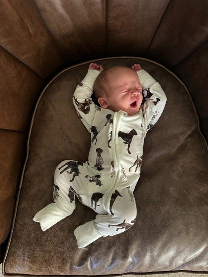 Baby wearing a German Shorthaired Pointers print convertible zip footies, printed on soft white fabric. 