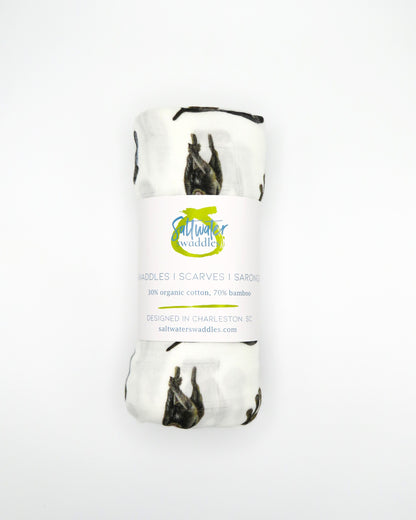 Unisex baby swaddle blanket featuring German Wirehaired Pointers printed on soft white fabric, ideal for newborn comfort and nursery use.