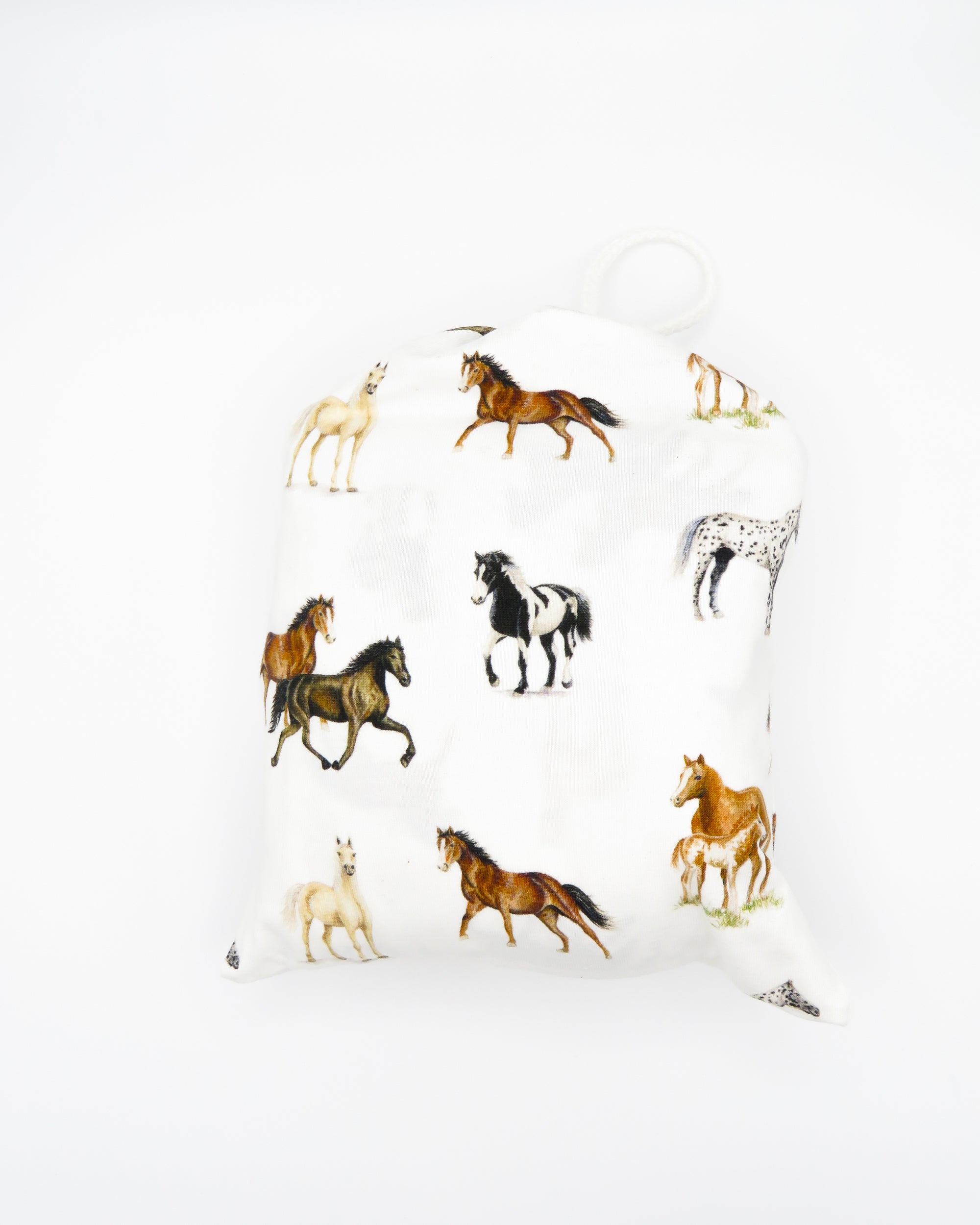 Our Harbor Horses” crib sheet featuring hand-painted, colorful horses printed on soft white 100% cotton jersey, fitted for cribs or toddler beds, perfect for a horse-themed nursery.