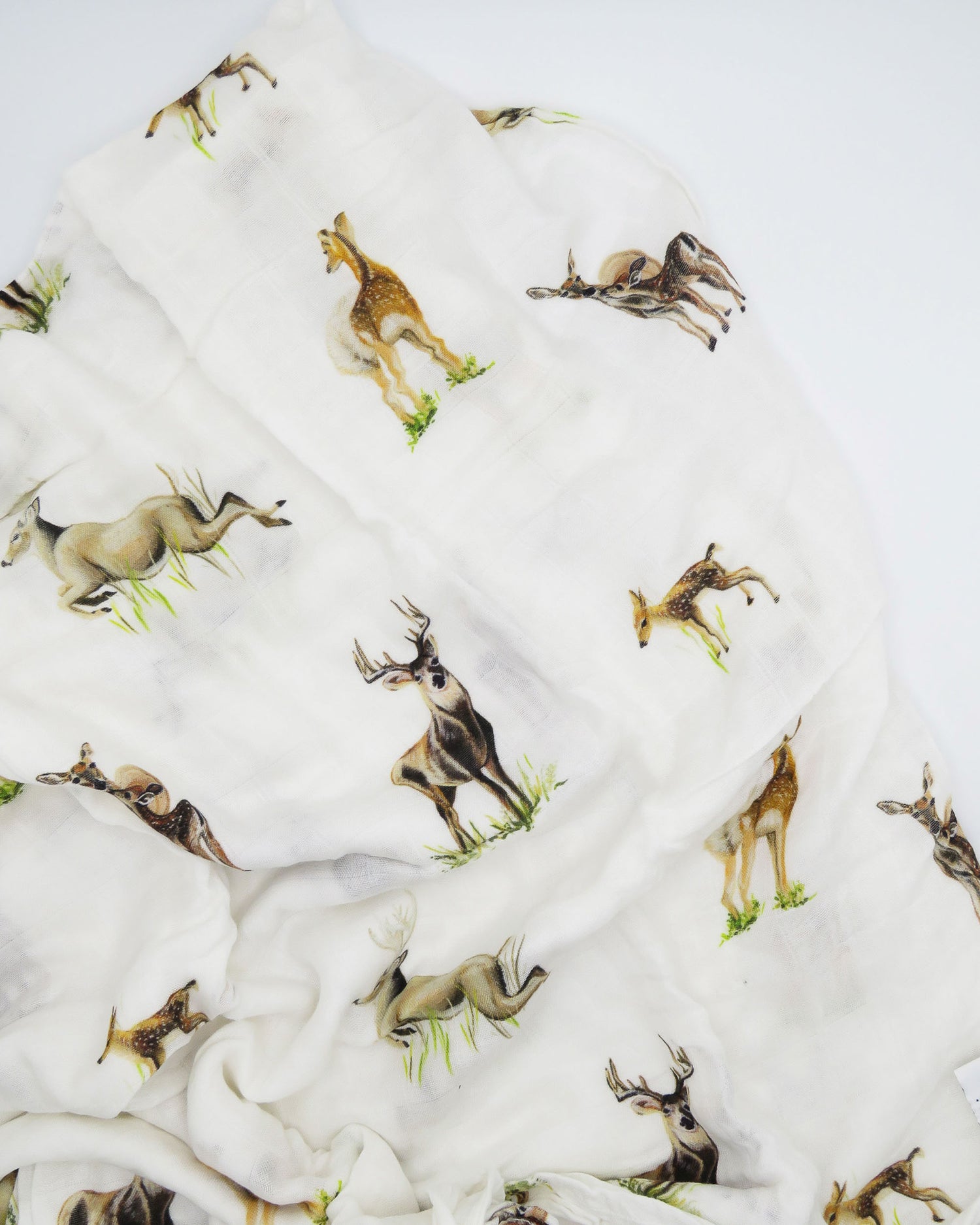 Little Fawn, Big Yawn Deer hand-painted swaddle with bucks, does, and fawn, perfect for your little sportsman or sportswoman, made from soft 30% white organic cotton and 70% bamboo blend.