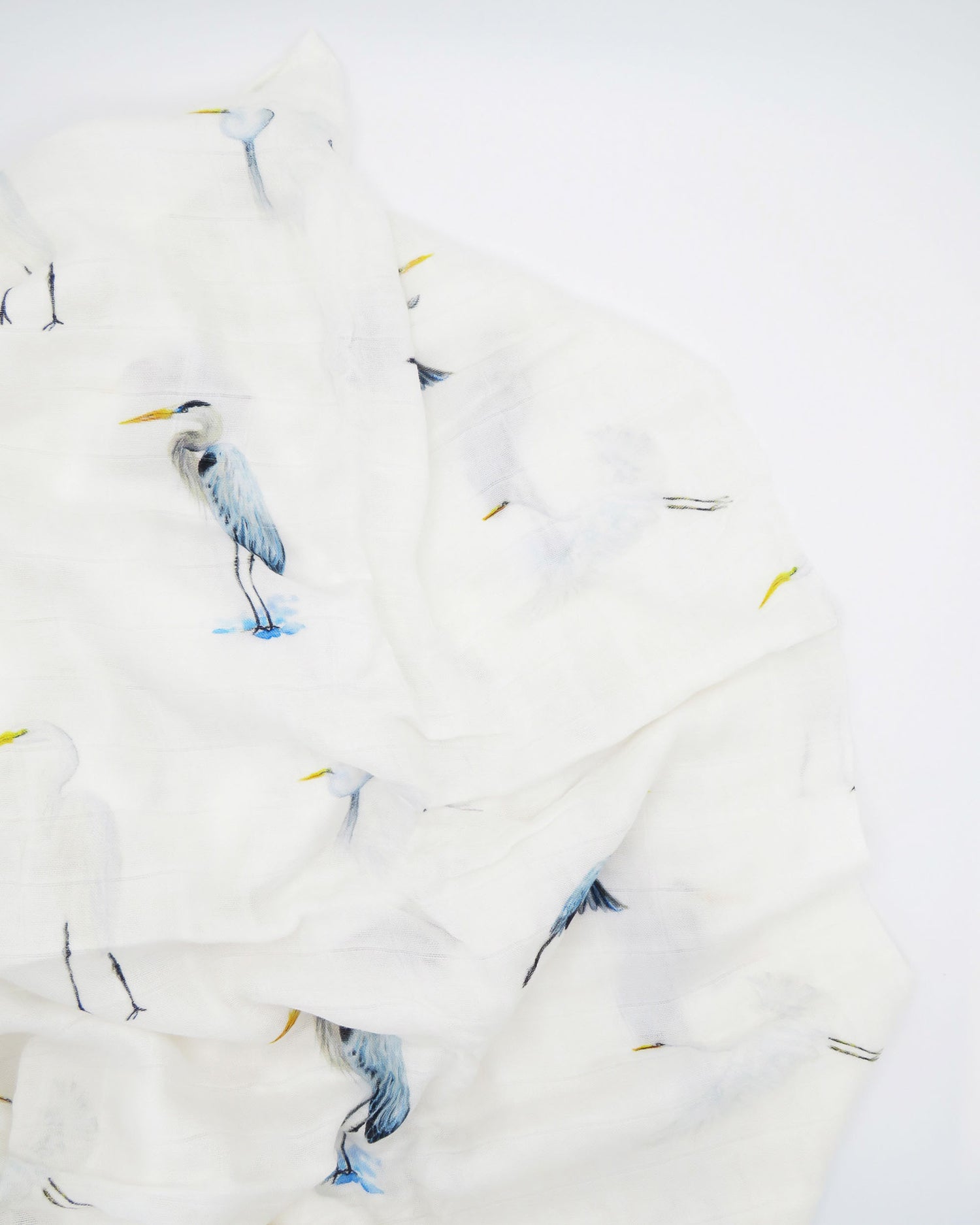 Southern Storks Baby Swaddle Blanket for Newborns. Displayed on a white background. A perfect addition to your hospital bag.