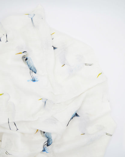 Southern Storks Baby Swaddle Blanket for Newborns. Displayed on a white background. A perfect addition to your hospital bag.