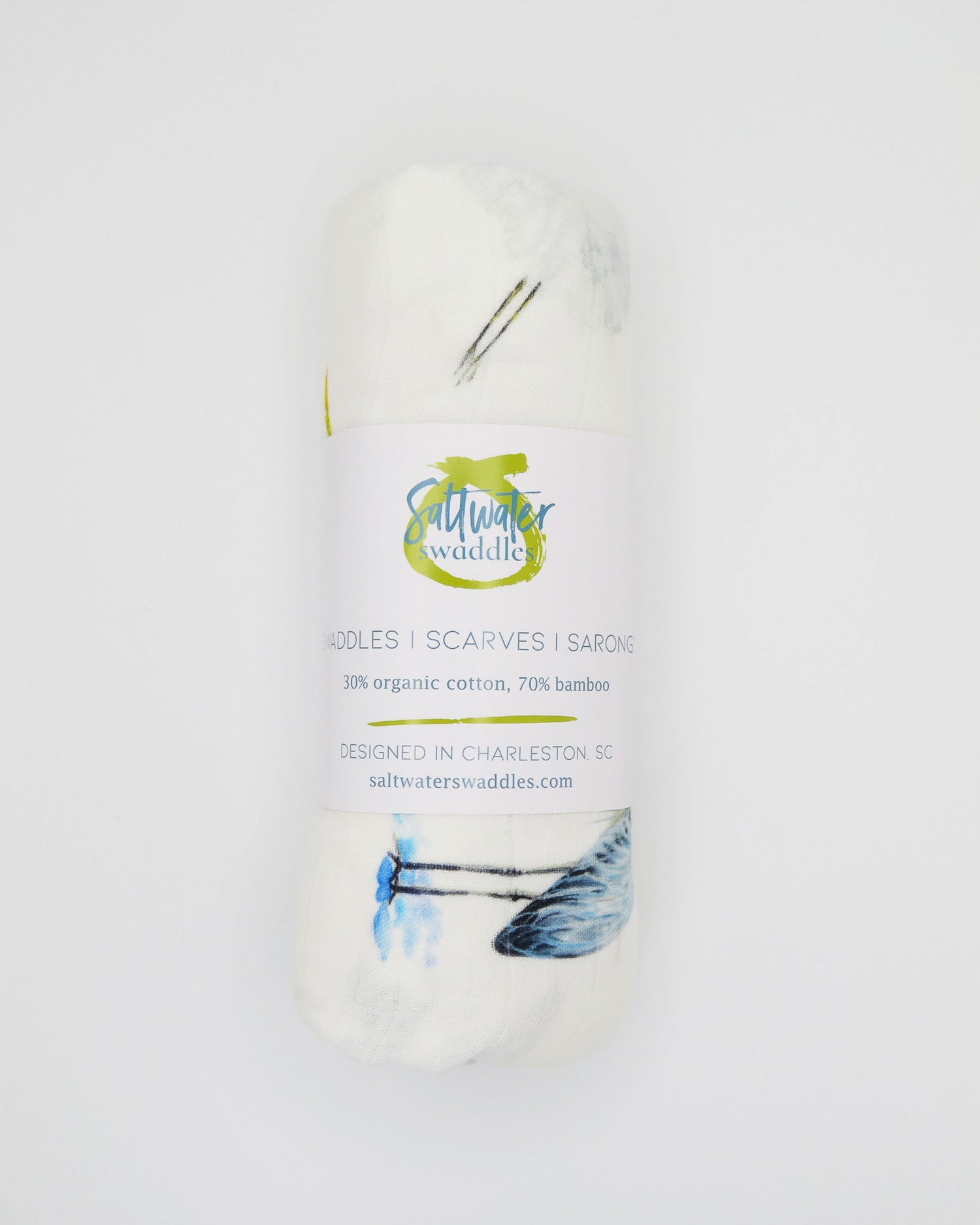 Southern Storks Baby Swaddle Blanket for Newborns. Rolled and displayed on a white background. A perfect addition to your hospital bag.