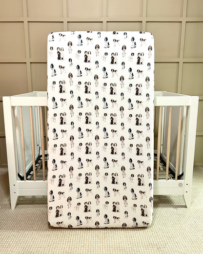 Soft Springer Spaniel print crib sheet for baby nursery. Hypoallergenic and breathable crib bedding. Springer Spaniel dogs printed on soft white fabric.