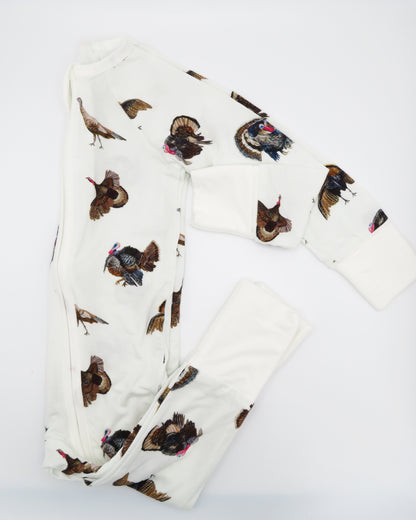 Convertible zip baby footie in festive turkey trot pattern for boys and girls. Printed on soft white fabric, Perfect for indoors and outdoors.