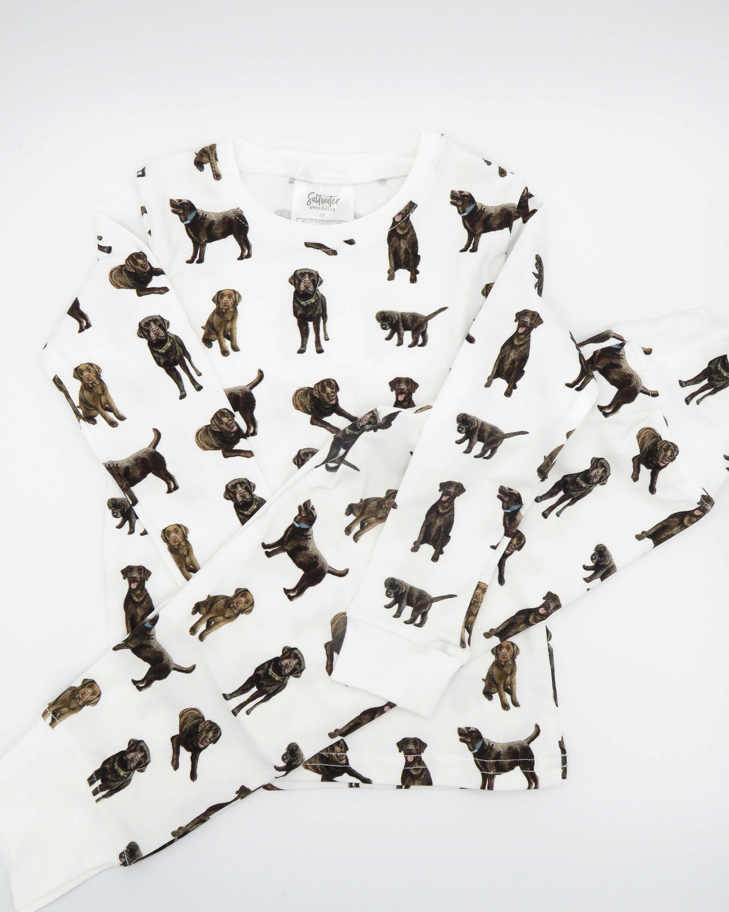 Adorable kids soft and comfy pajamas featuring Chocolate Labs printed on soft white fabric. 