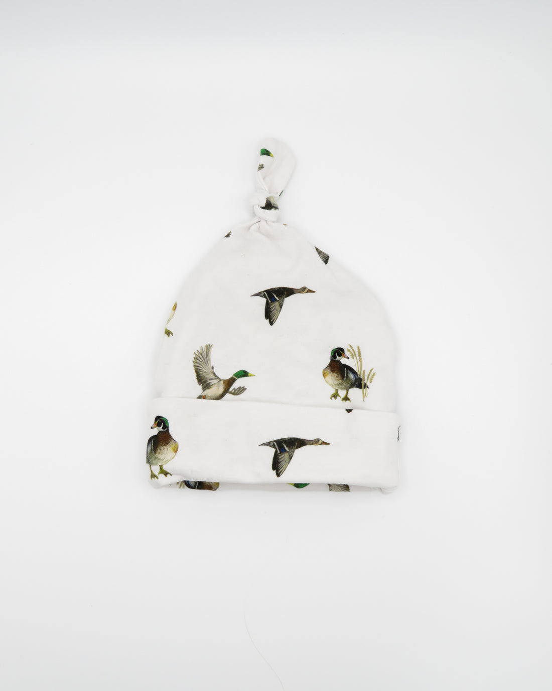 Newborn hat featuring a playful diving ducks print on a soft cotton fabric